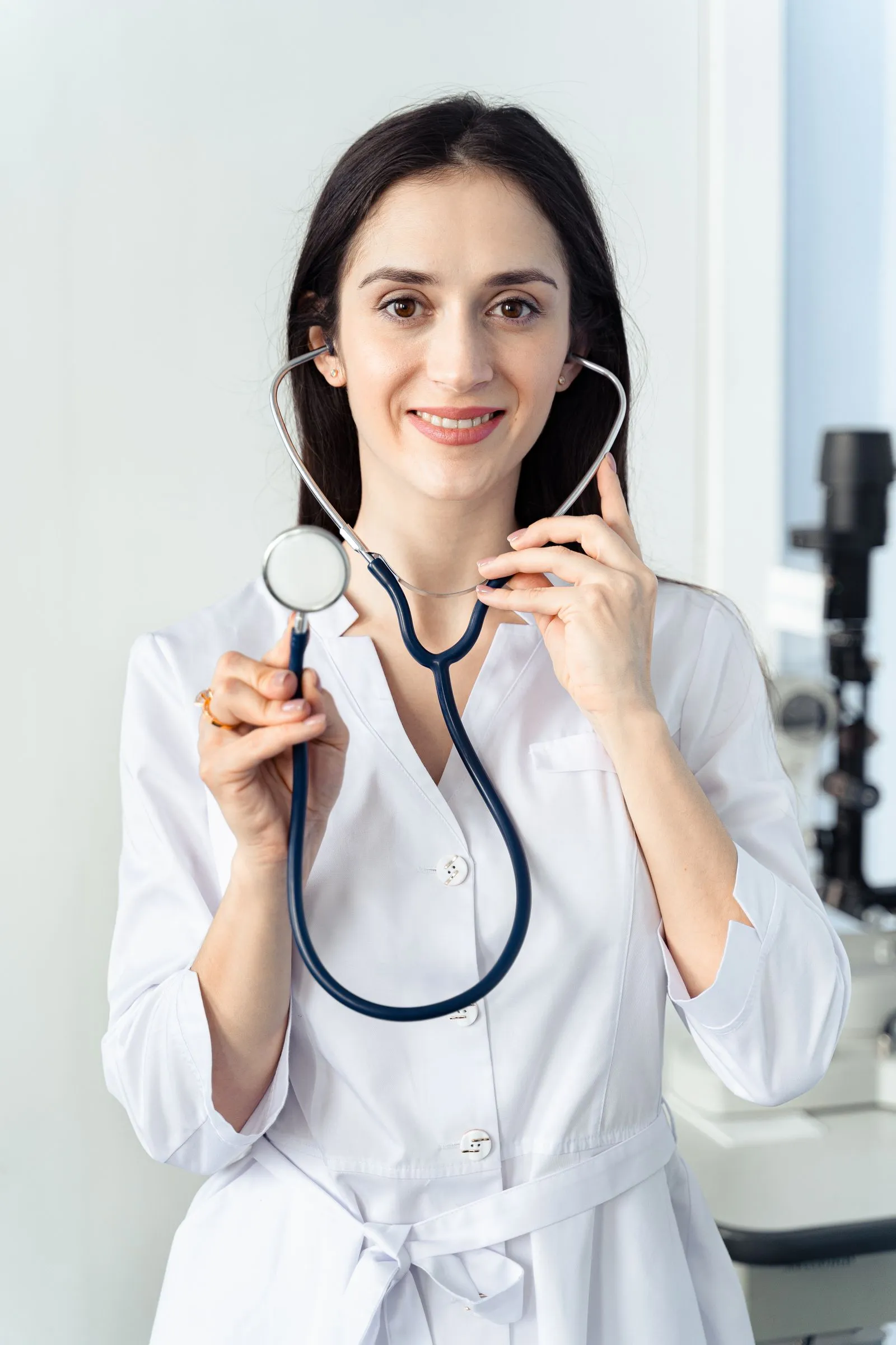 Portrait of Dr. Rachel Ellis holding a stethoscope